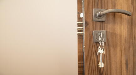 House keys on the door. Security. Real estate