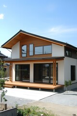 Fototapeta premium Modern Japanese Style House With Wooden Deck And Large Windows