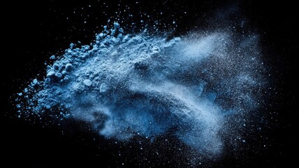 Blue Clay powder explosion captured mid-air against a black background, showcasing the vibrant color and fine particle texture of the powder in a dynamic burst.