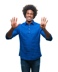 Afro american man over isolated background showing and pointing up with fingers number nine while smiling confident and happy.