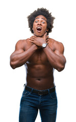 Fototapeta premium Afro american shirtless man showing nude body over isolated background shouting and suffocate because painful strangle. Health problem. Asphyxiate and suicide concept.