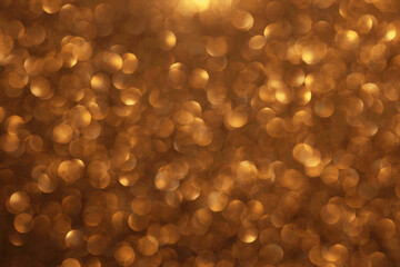 Golden glitter festive bokeh background, abstract defocused texture. Holiday lights