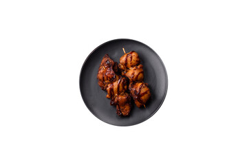 Grilled chicken or turkey shish kebab with salt, spices and herbs