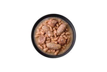 Cassoulet with white beans, meat and sausages, vegetables, salt and spices