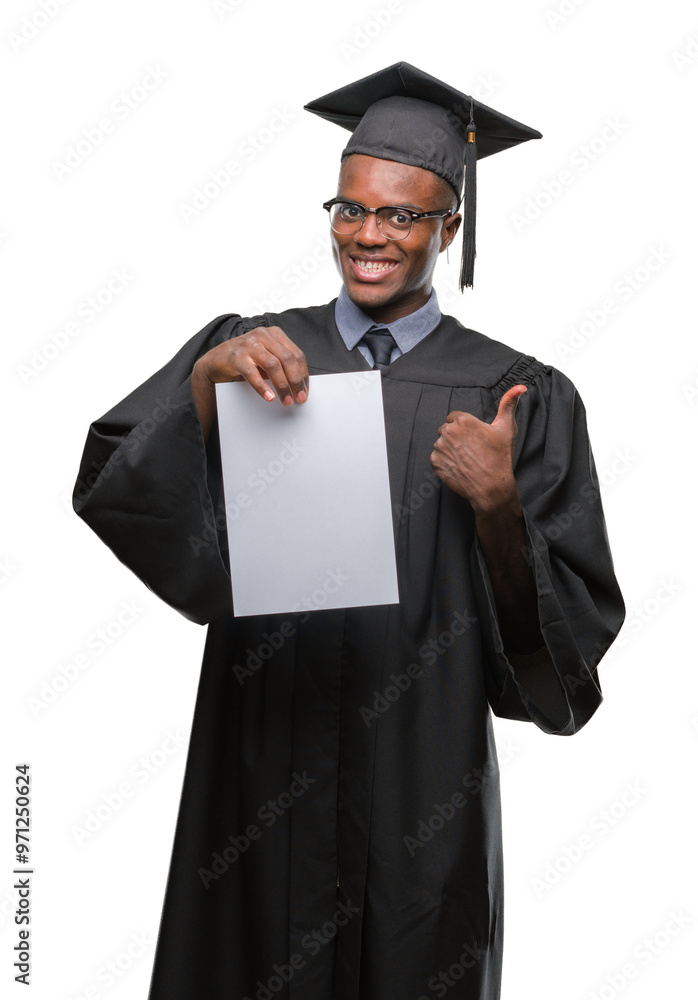 Canvas Prints Young graduated african american man holding blank paper degree over isolated background happy with big smile doing ok sign, thumb up with fingers, excellent sign