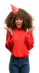 African american woman celebrates birthday very happy and excited, winner expression celebrating victory screaming with big smile and raised hands