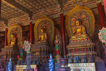 Giant Buddha statue at Yungang Grottoes in Datong, Shanxi