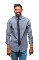 Adult hispanic business man over isolated background winking looking at the camera with sexy...