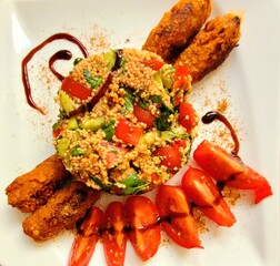 Bulgur with vegetables and vegan rolls