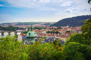 panoramic cityscape of Prague from Letna Hill park