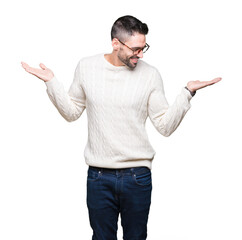 Young handsome man wearing glasses over isolated background Smiling showing both hands open palms, presenting and advertising comparison and balance