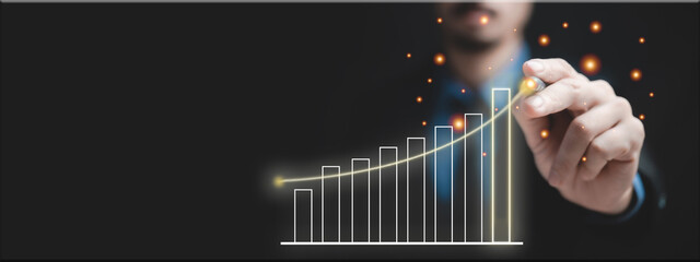 hand holding a business chart
