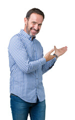 Handsome middle age elegant senior man over isolated background Inviting to enter smiling natural with open hand