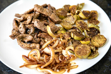 Traditional, strong and nutritious real food, liver with okra and onion