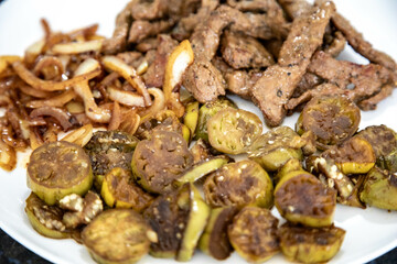 Traditional, strong and nutritious real food, liver with okra and onion