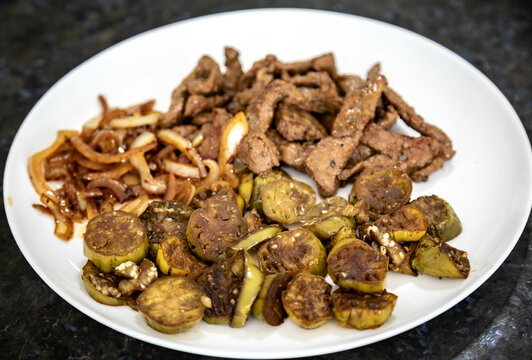 Traditional, strong and nutritious real food, liver with okra and onion