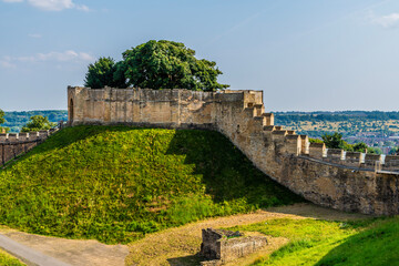 Fototapeta premium A view across the Castle courtyard towards the Lucy Tower in Lincoln, Lincolnshire in summertime