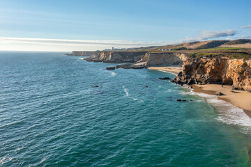 Beautiful landscape along Highway 1 in California. Pacific Ocean coastline along the bay, aerial view. Travel and vacation concept.