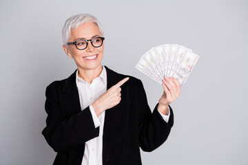 Photo of attractive mature woman professional ceo hold point look money fan dressed formalwear...