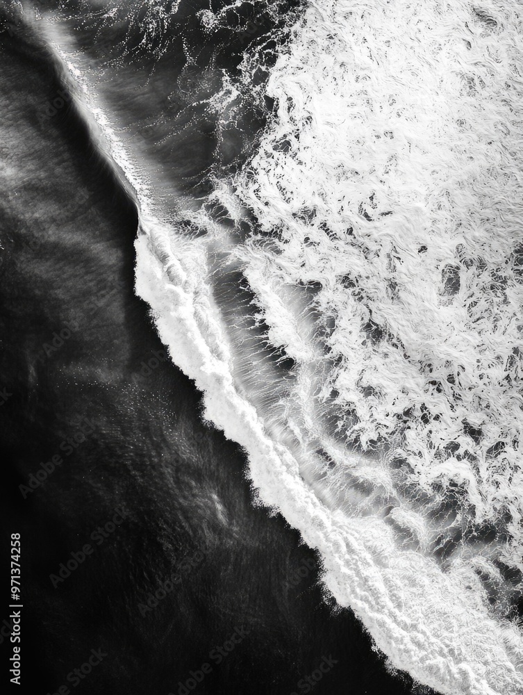 Poster the image is a black and white photo of a wave crashing on a beach. the wave is large and powerful, 