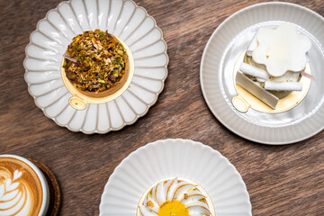 A close up of lemon tart with elegance decoration in a showcase of bakery or coffee shop, concept of sweet and dessert, juicy and freshness, delicious cake, modern and fancy decoration style