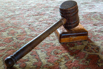 A hammer and gavel in a courtroom