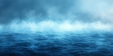 Fototapeta premium A moody, foggy seascape with the ocean waves rolling in the distance.