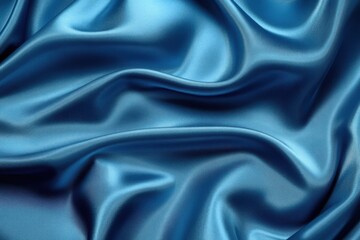 Fototapeta premium Blue satin cloth, luxury background for products display.