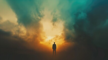 Fototapeta premium Facing my Faith. Silhouette of a man standing in the middle of the clouds.