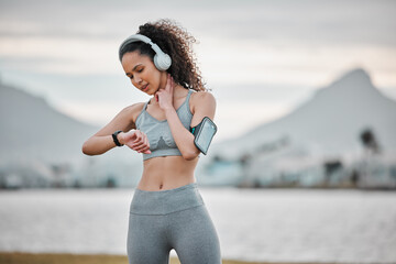 Time, pulse and woman in nature for exercise, marathon training and workout listening to music,...