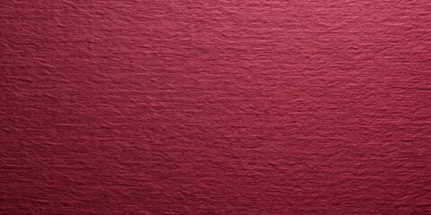 Burgundy paper with a luxurious fine texture perfect for backgrounds and crafts