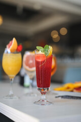delicious alcoholic drinks stand on the table in a restaurant