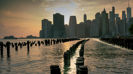 a beautiful sunset behind manhattan