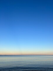 SUNSET ON THE BLUE WATER 