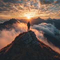 A lone hiker stands on a mountain peak, looking out over a sea of clouds and distant mountain ranges, bathed in the warm glow of a majestic sunrise ideal for promoting adventure, solitude