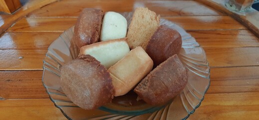 Fried mantau bread or roti mantau is served on a plate