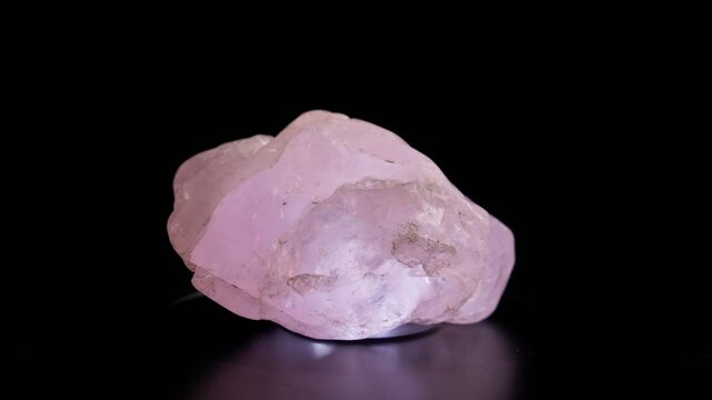 Footage Crystal Rose Quartz Turning. High quality 4k footage