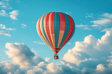 Obraz premium Colorful hot air balloon soars in vast blue sky with puffy white clouds