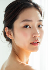 Naklejka premium Beautiful Asian woman healthy skin care female portrait lady cosmetic beauty model spa girl natural makeup fresh clean youth beautiful face happy treatment young white background skincare wellness