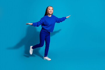 Full length body photo funny youngster trendy girl standing one leg keep balance flying bird...