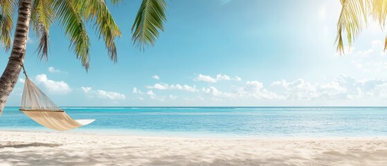 Fototapeta premium Hammock in palm tree, beach Blue sky overhead, ocean backdrop