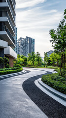 A modern driveway in high rise building complex with lush greenery