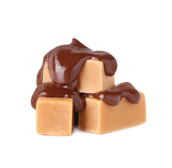 Tasty caramel candies with melted chocolate isolated on white