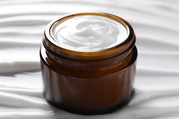 Jar with face cream, closeup. Cosmetic product