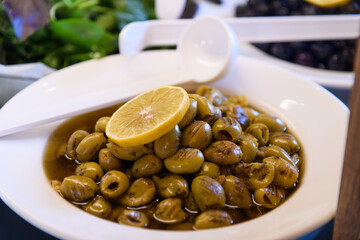 Close-up of Grilled Green Olives at Hotel Restaurant Buffet..