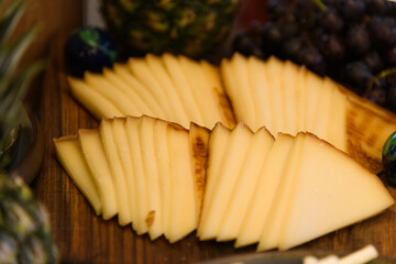 Assorted cheese varieties displayed at a hotel buffet
