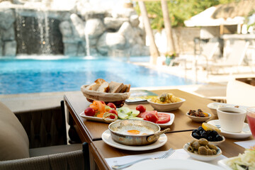 Omelette and Bread by the Poolside Breakfast