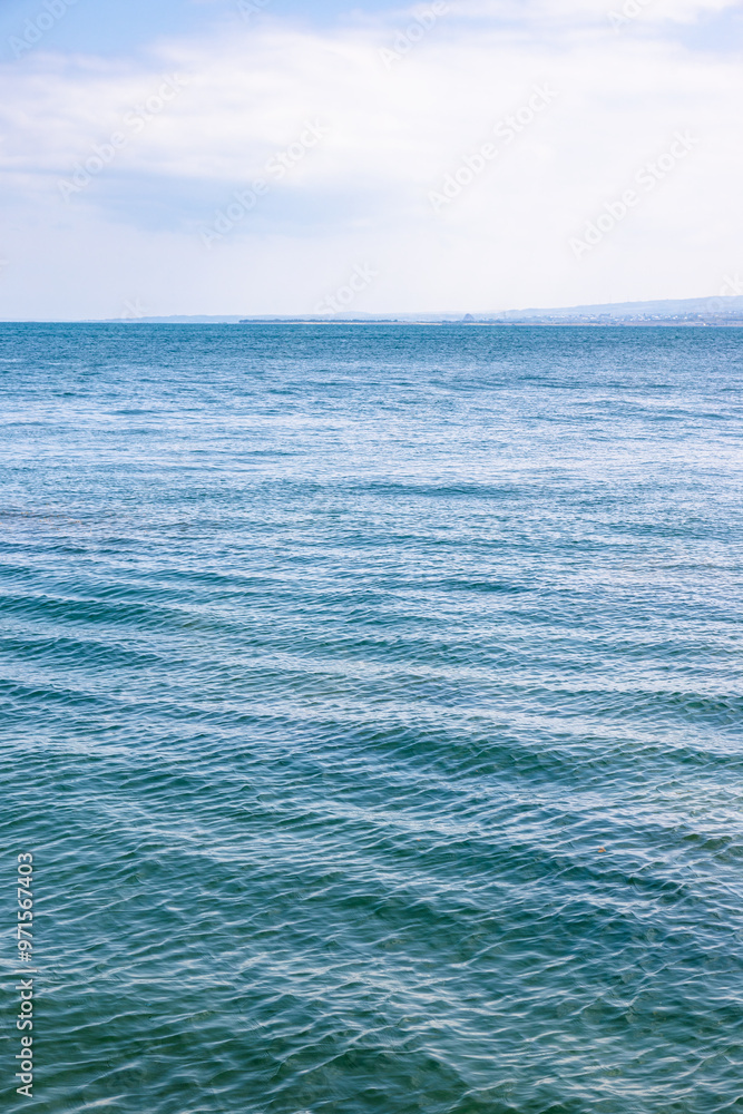 Wall mural surface of blue water of lake sevan, armenia