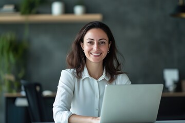 Naklejka premium businesswoman entrepreneur professional leader confident workplace laptop success executive manager smiling female 30s portrait business