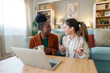 Diverse Female Entrepreneurs Running Business from Home